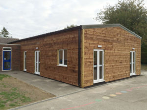 Wood clad extension building with windows & doors
